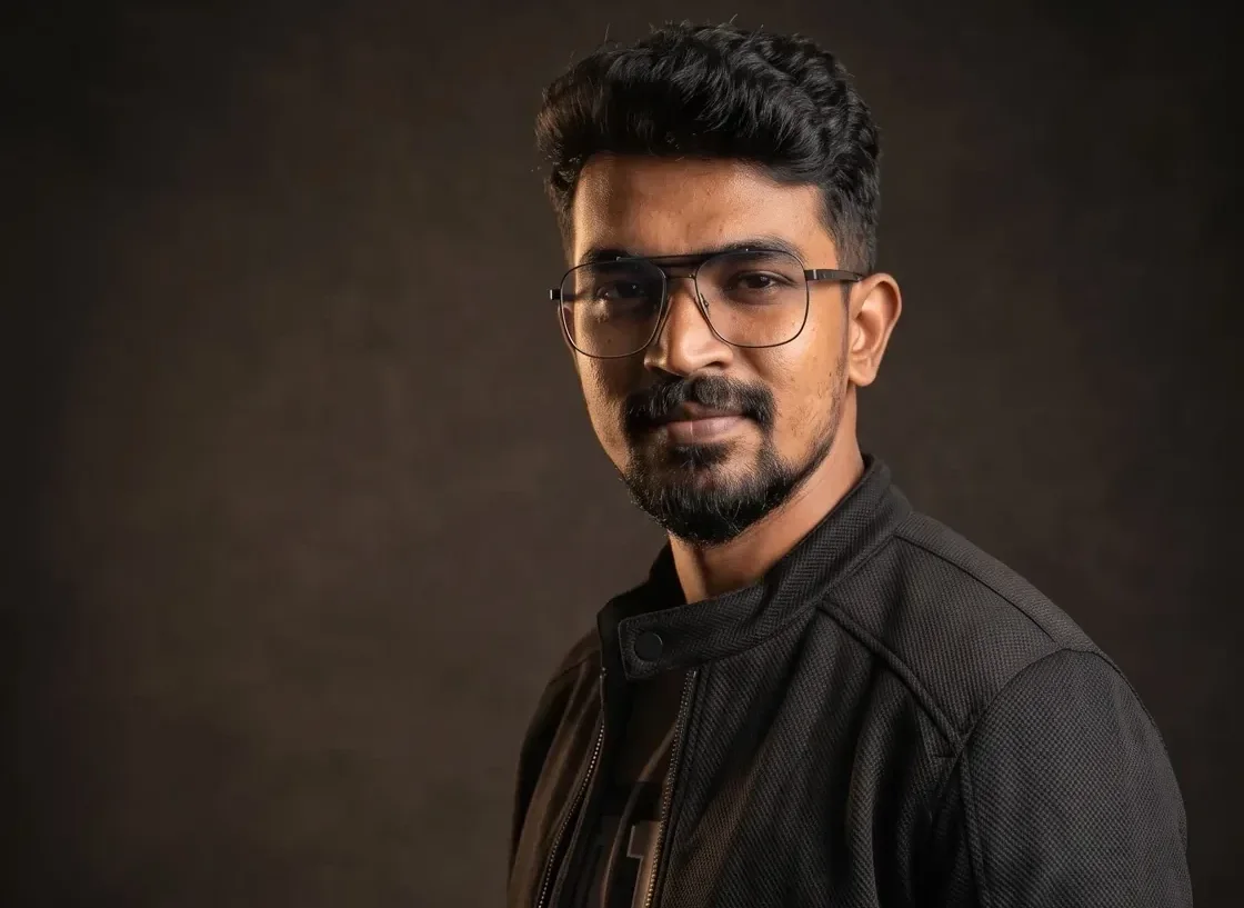 Wide moody crop of the AtherFlow founder in a dark studio Wide moody crop of the AtherFlow founder in a dark studio with warm side light, AtherFlow Chennai