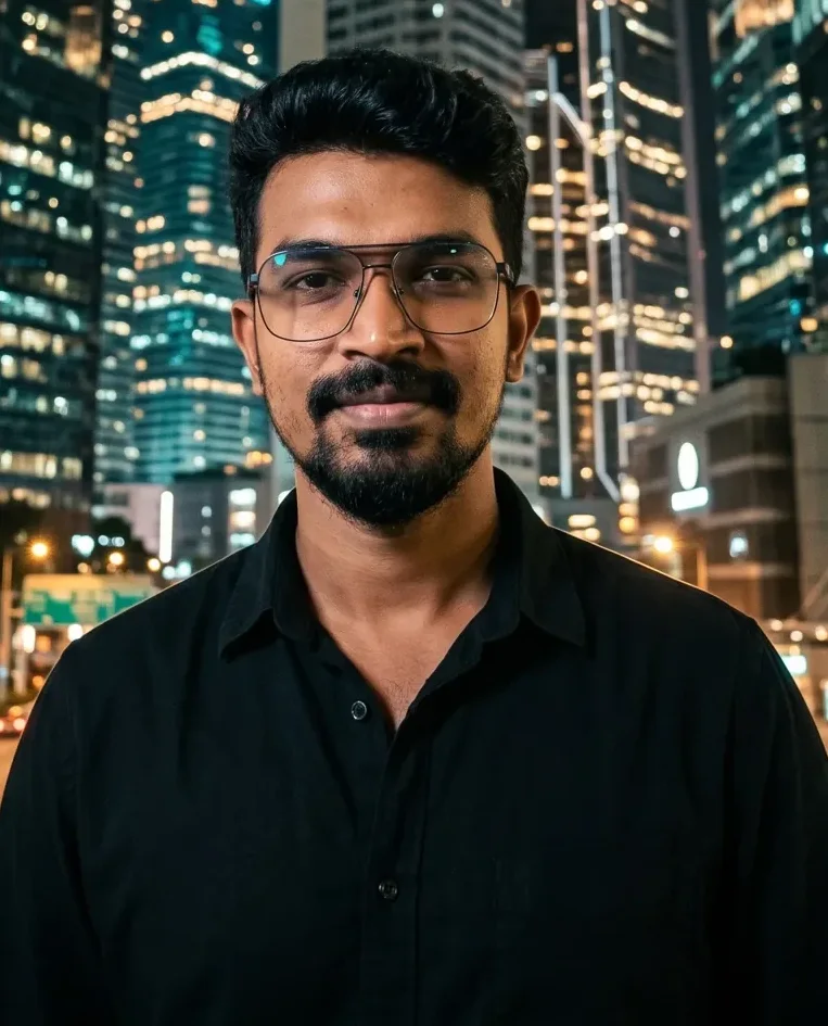 Close-up of Veera Raghavan as a global business traveller on a night street with glowing towers